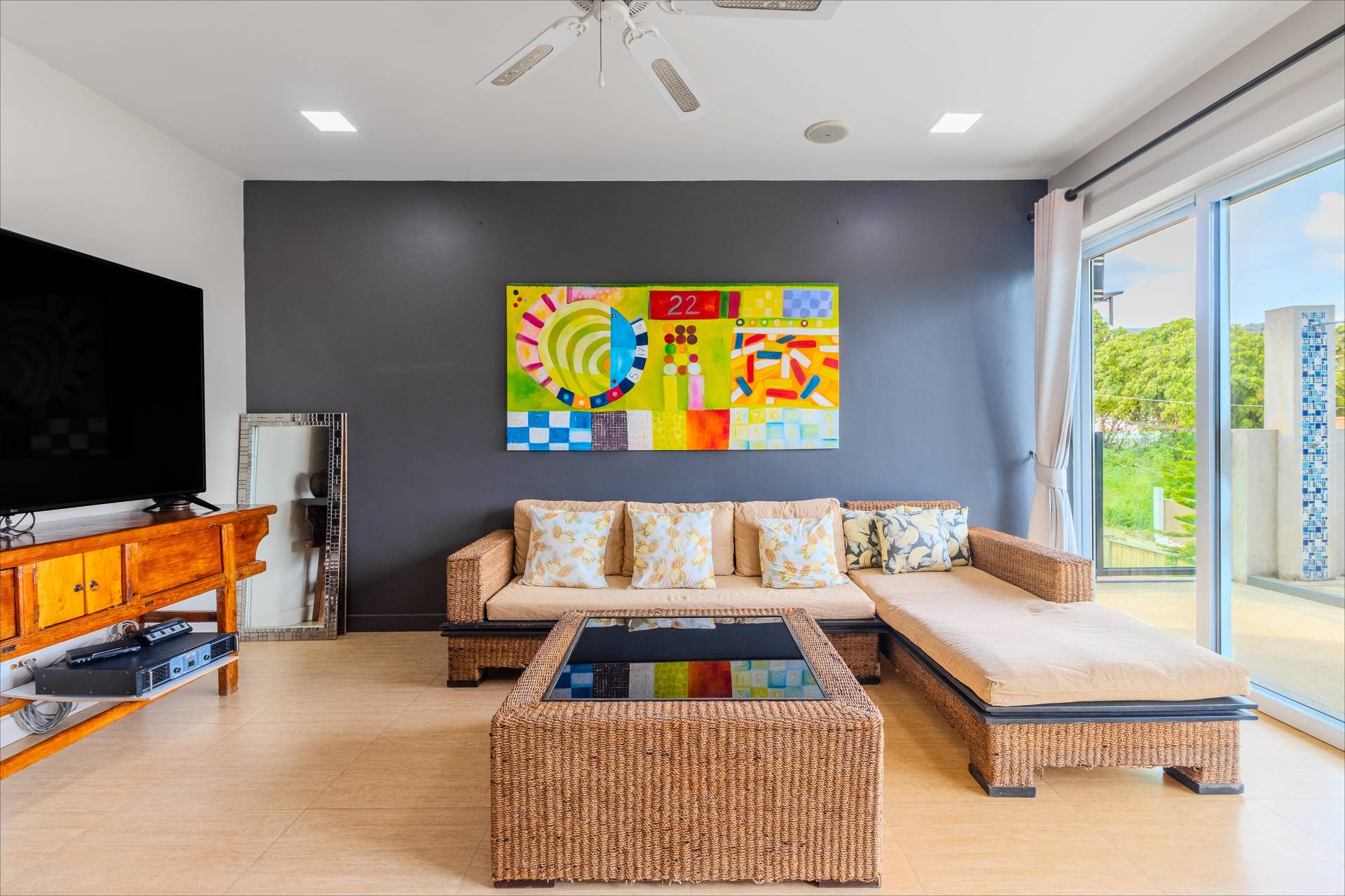 Indoor entertainment and lounge area where groups can gather for movie nights