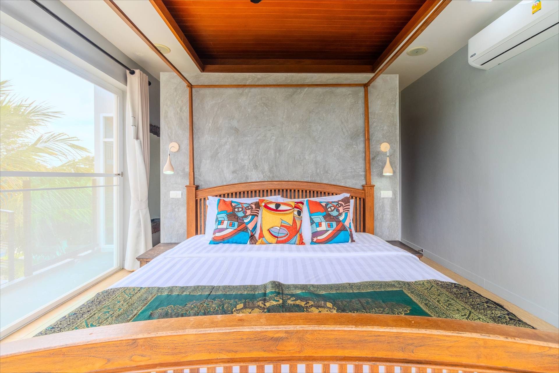 Deluxe room with wooden ceiling and balcony views