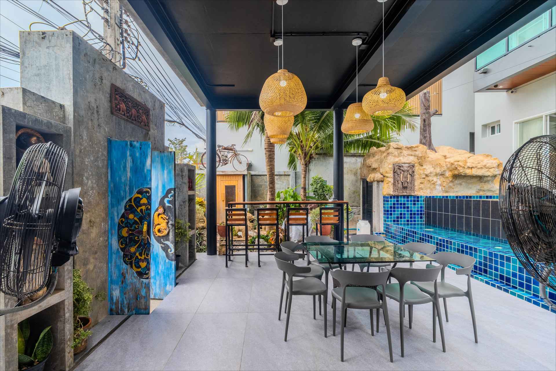 Outdoor dining and BBQ area set up for group feasts under the Phuket stars